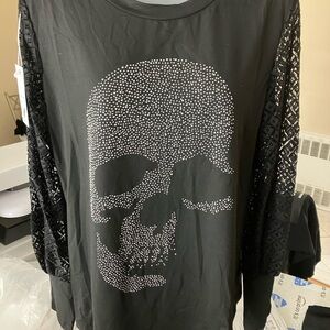 Ladies NWT. Rhinestone skull long sleeve lace armed shirts